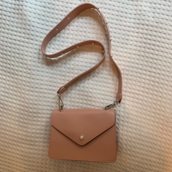 Urban Outfitters Handbags - pink purse!